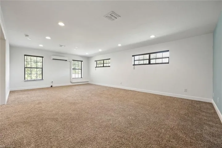 Upstairs movie room, den, etc..