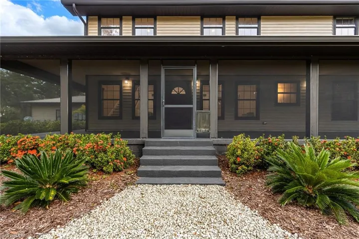 Entrance to property with covered porch