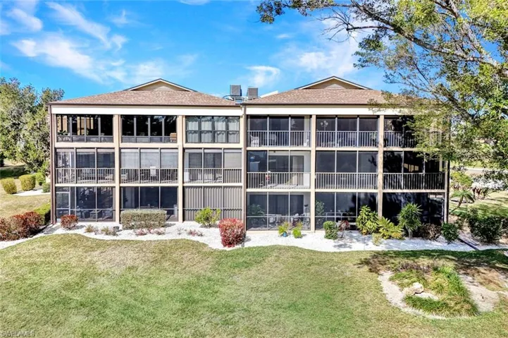 Rear View of Building C- 6300 Cougar Run- #104- LOVE THE 1ST Floor Unit!- Corner End!