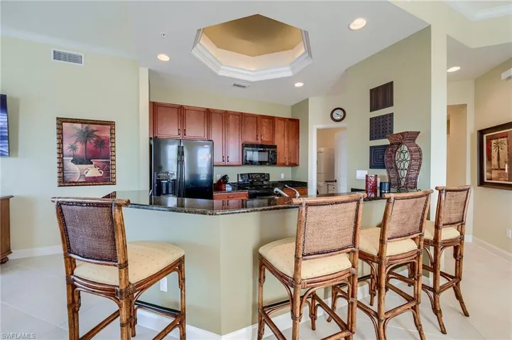 Open Kitchen! Wood Cabinets!