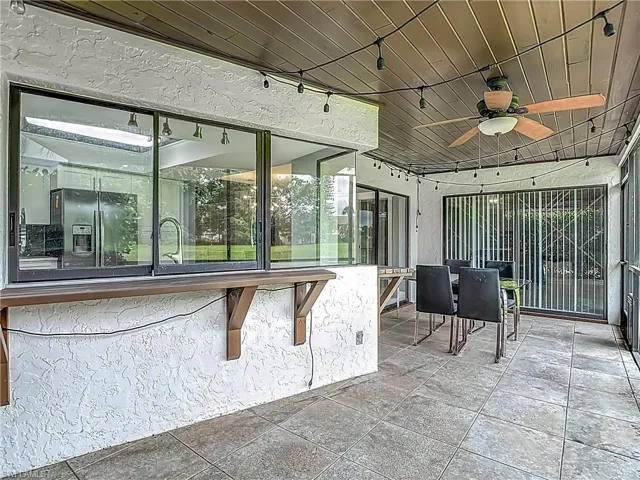 View of patio / terrace featuring a ceiling fan and outdoor dining space