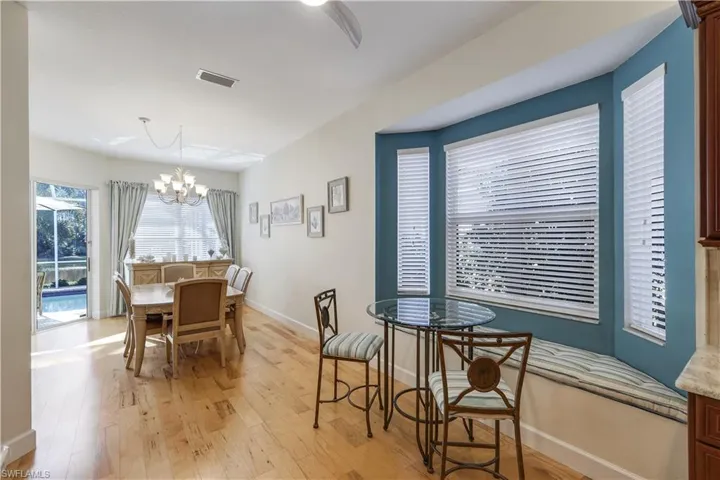 Eat-in kitchen nook and spacious dining room.