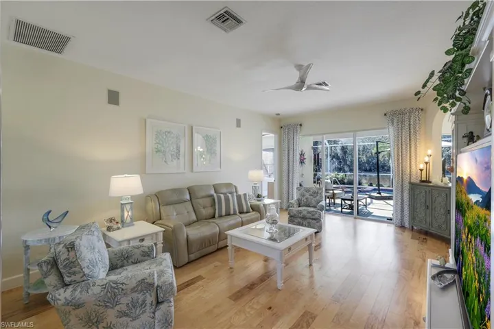 Volume ceilings and gorgeous laminate hardwood flooring through out living areas