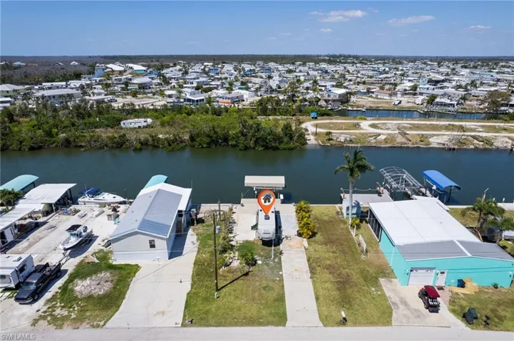 Another Rear Elevation Shot of the Property and Boat Lift