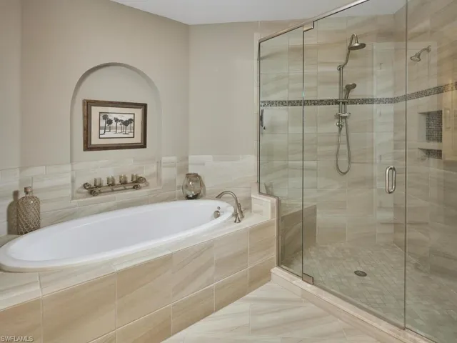 Bathroom with shower with separate bathtub