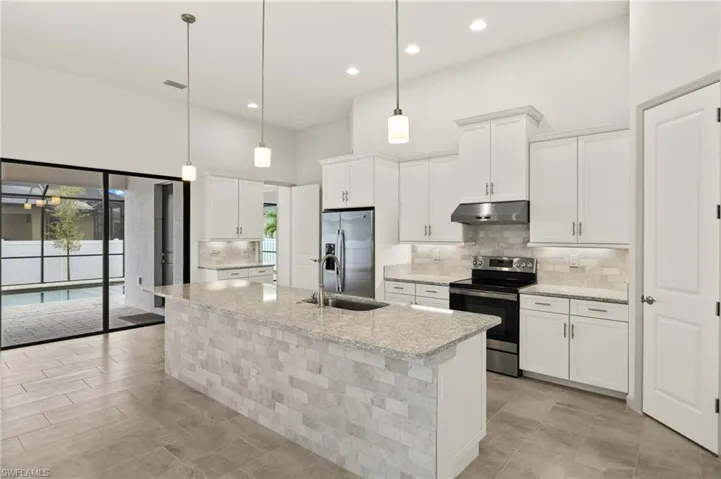 Kitchen with added coffee or wine cabinets. All Cabinets have undercabinet lighting.