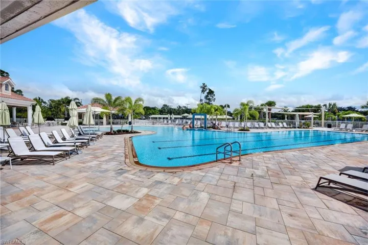 Community pool with a patio area