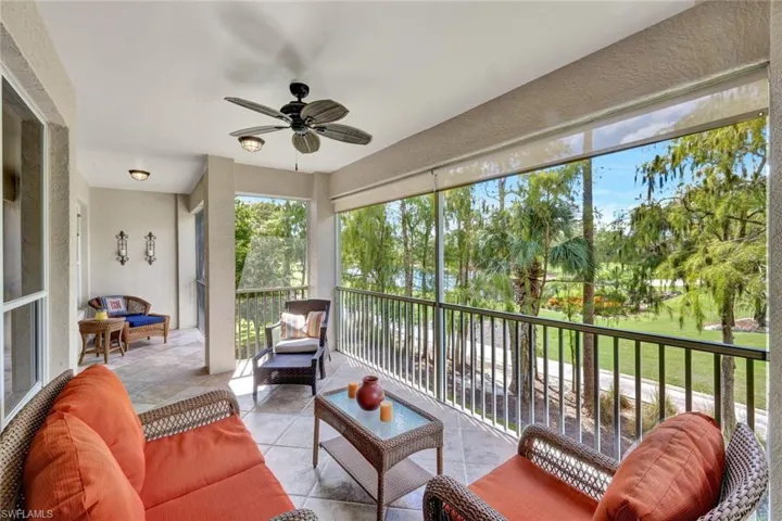 Sunroom / solarium with healthy amount of natural light and tile patterned flooring