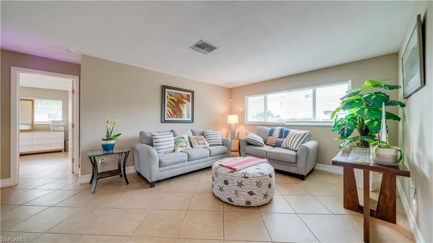 Living room; entry to Master Suite on left