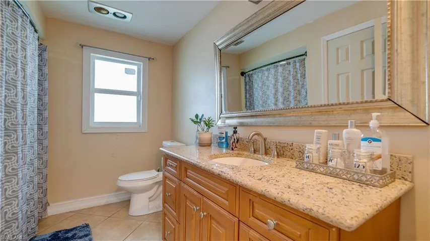 Guest Bathroom featuring jetted tub