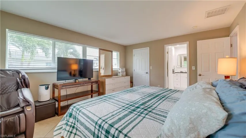 Master Suite with walk in closet and private bathroom