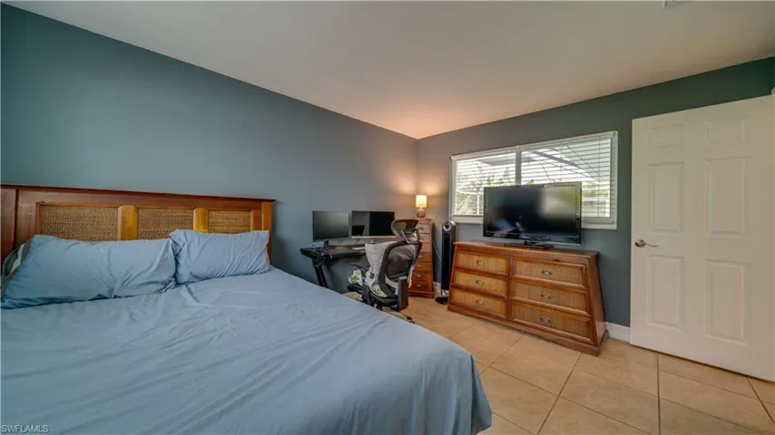 Guest Bedroom with view of Pool