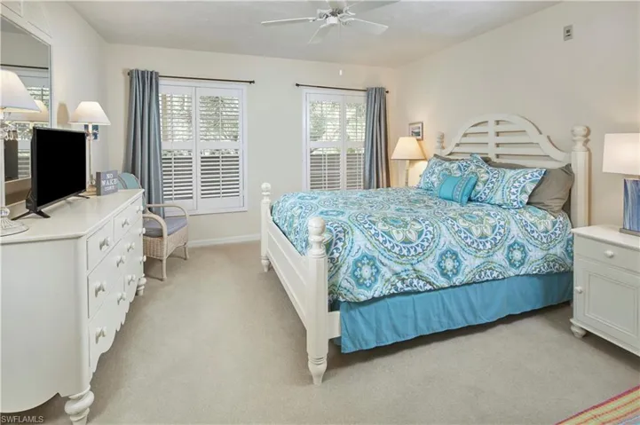 Spacious guest bedroom, privately tucked away on the Eastern side of the home.