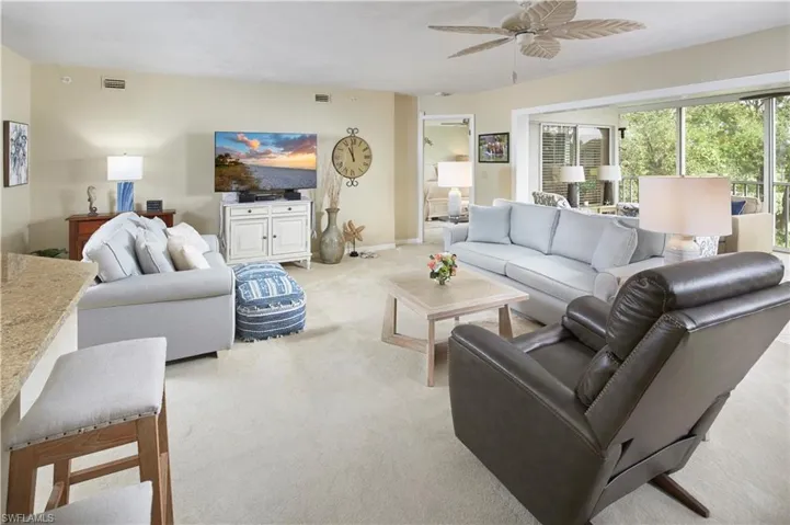 Expansive living area is perfect for friends and family to gather.