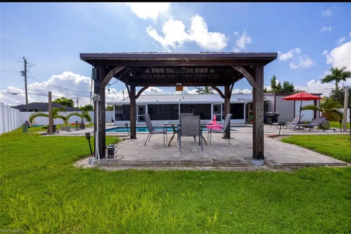 View of patio featuring a gazebo