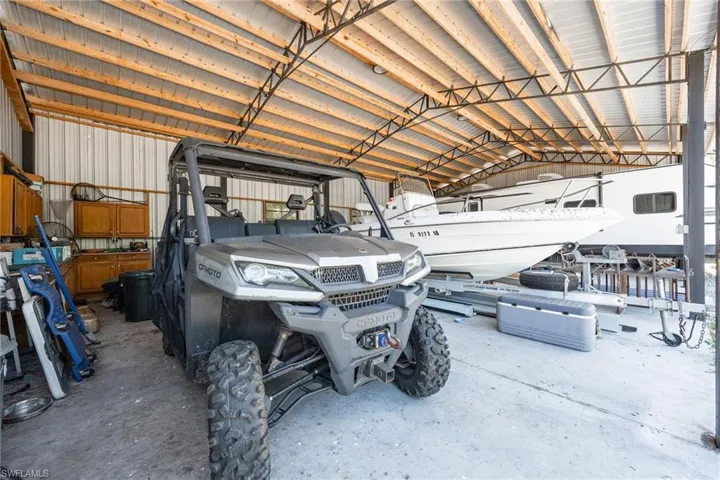 Garage featuring metal wall