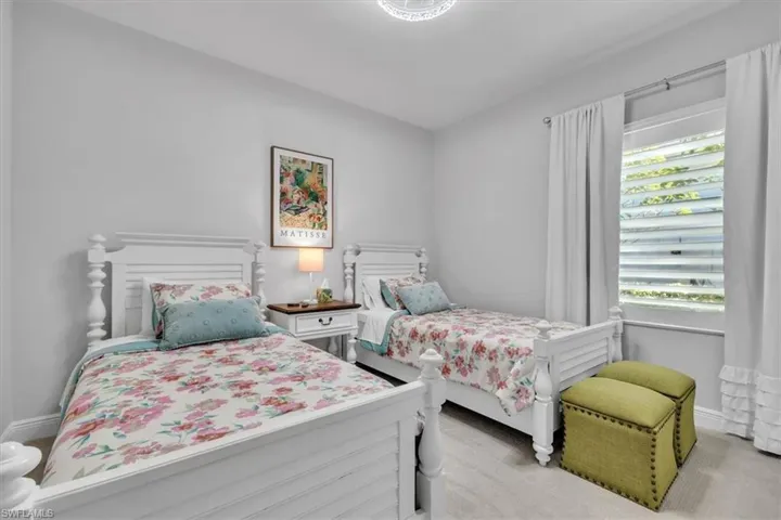 Bedroom featuring baseboards