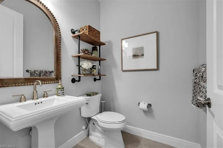 Half bath with baseboards
