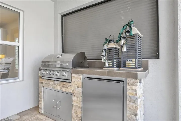 View of patio with area for grilling