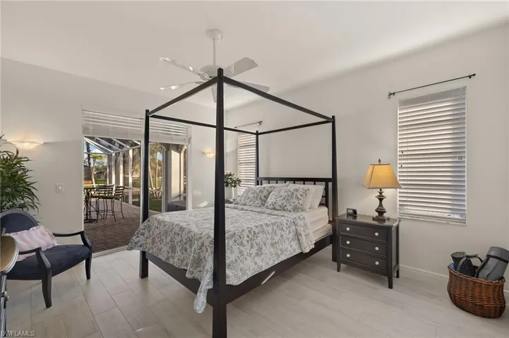 Primary bedroom with slider to the lanai
