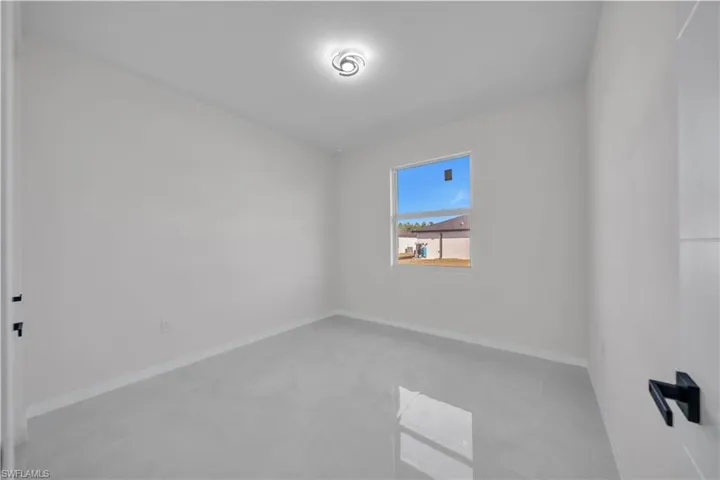 Empty room with baseboards