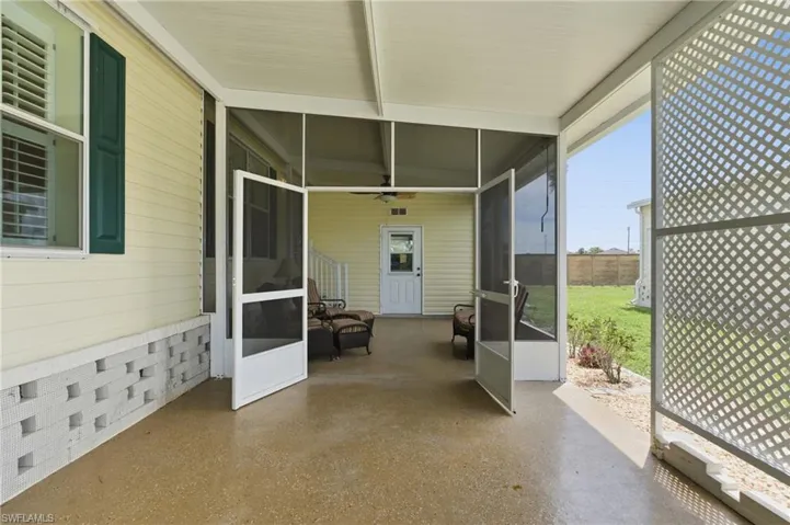 Car port and entrance to Florida room.