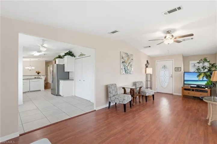 Living room and entrance to kitchen area