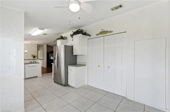 Across from breakfast area. Doors to washer and dryer.