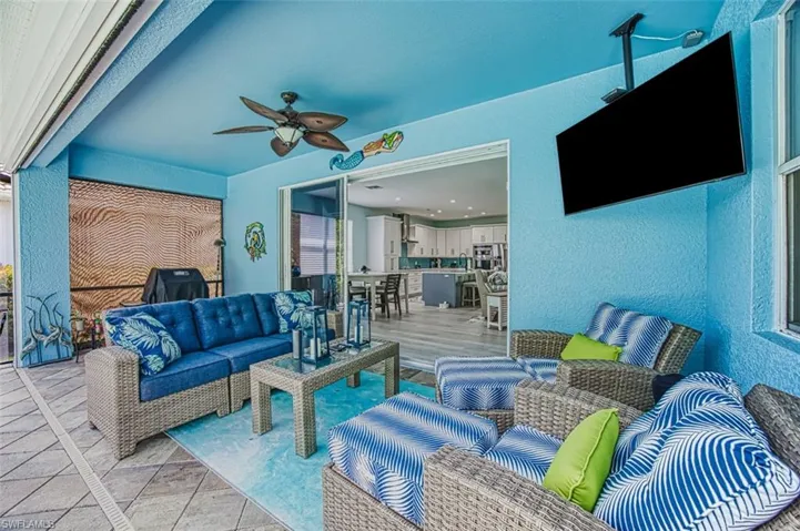 View of patio / terrace featuring an outdoor living space and ceiling fan