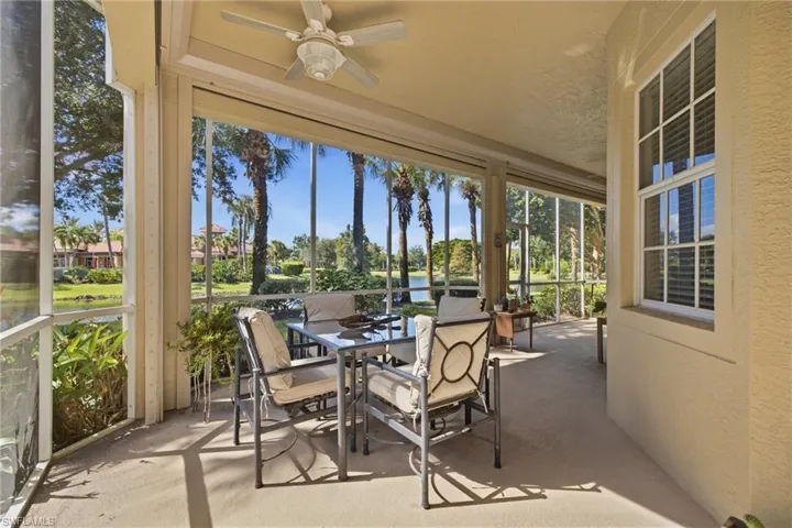 Lanai - View of lake, mature trees and clubhouse.