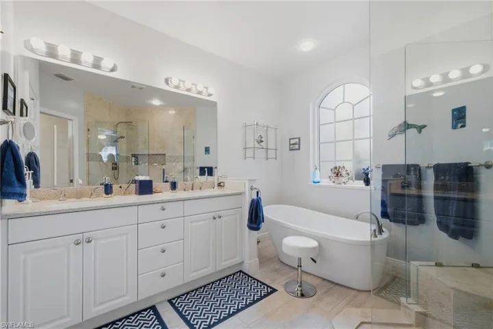 Primary Bathroom - Newly Remodeled with Large Walk in Glass Shower and Soaking Tub
