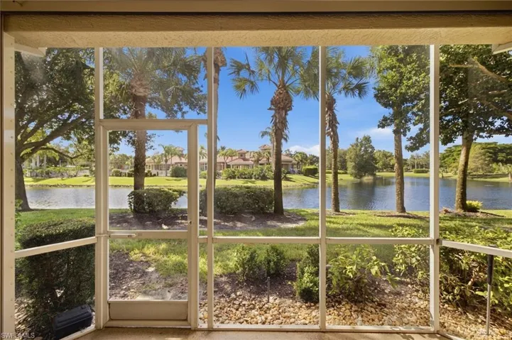 Lanai - View of lake, mature trees and clubhouse