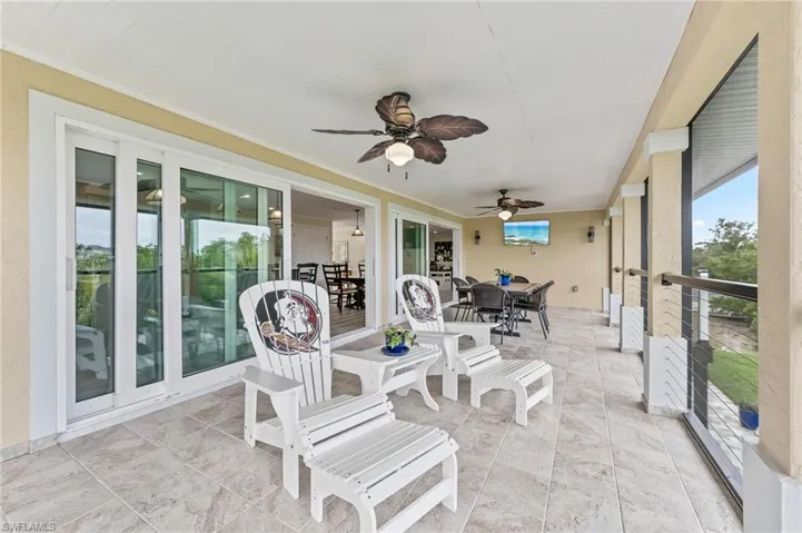 Ample seating for dining and relaxing at the spacious upper lanai