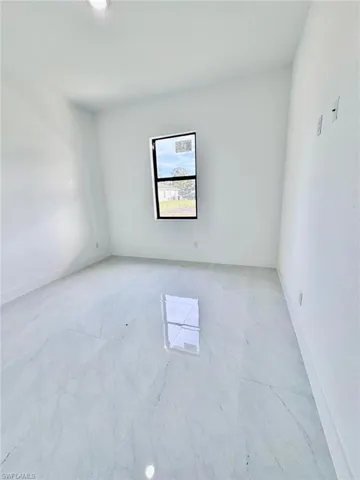 Spare room with baseboards