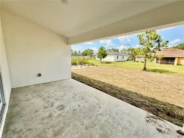Covered porch in the rear.
