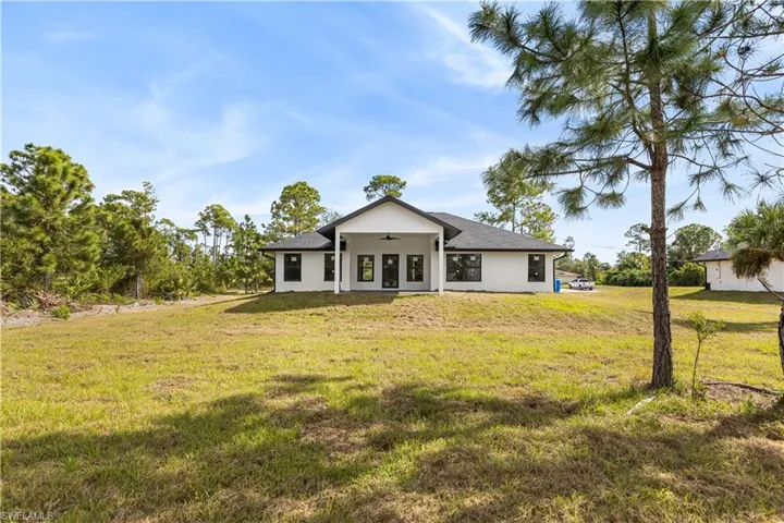 1218  Mc Kinley  AVE, Lehigh Acres, FL 33972