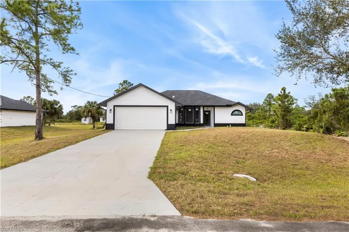 1218  Mc Kinley  AVE, Lehigh Acres, FL 33972
