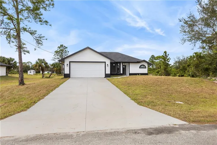1218  Mc Kinley  AVE, Lehigh Acres, FL 33972