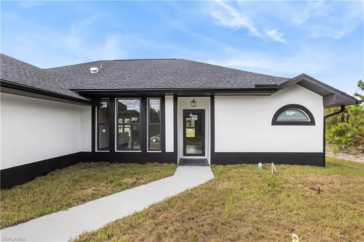 1218  Mc Kinley  AVE, Lehigh Acres, FL 33972