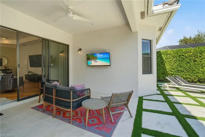View of patio with a ceiling fan