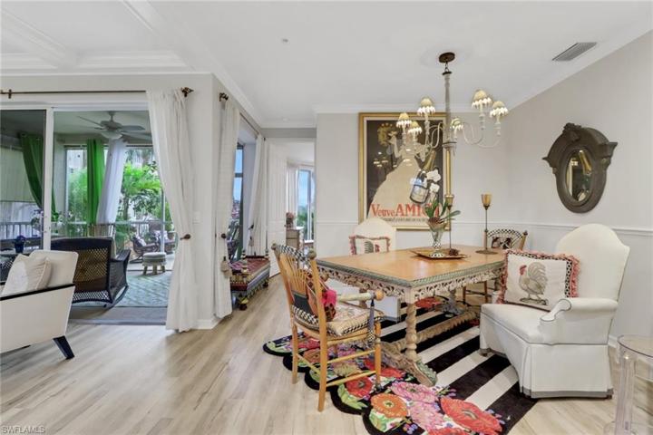 Dining area off kitchen with outdoor view and open to living space