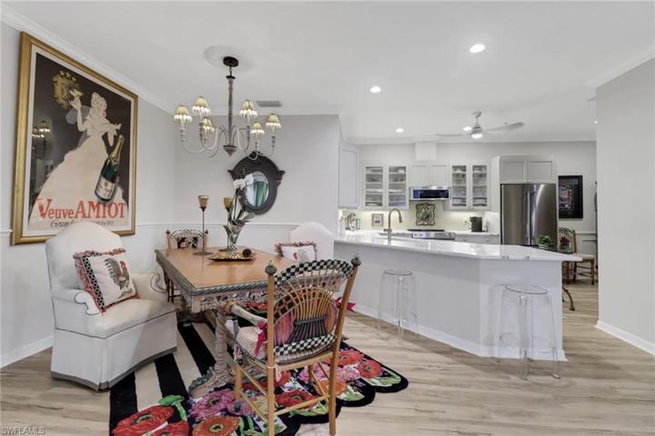 The kitchen has been opened and showcases ribbed glass cabinets and designer AAA quartz counters