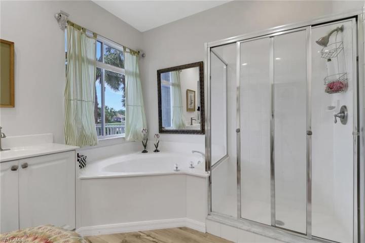Master bath featuring a soaking tub for relaxation