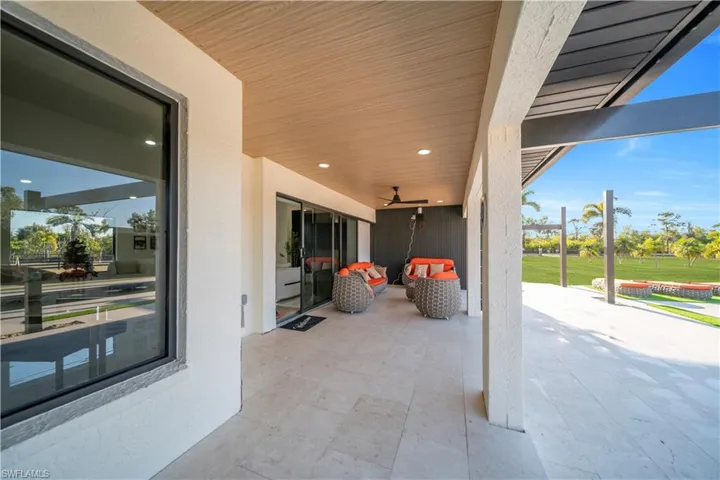 View of patio with ceiling fan