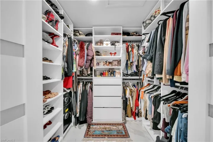 Walk in closet with attic access