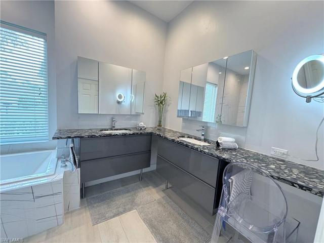 Primary dual sink vanities and make-up area