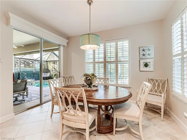 Dining room featuring healthy amount of natural light, and light tile patterned floors