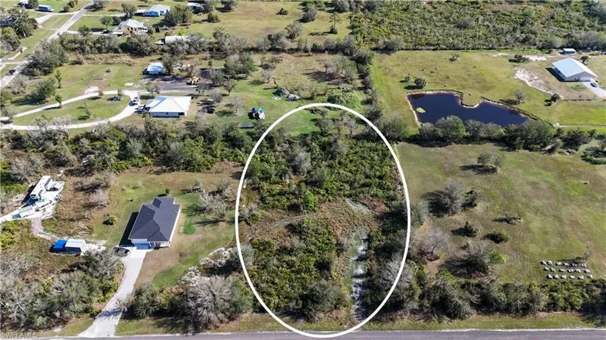 1.6 acre lot is approximately 205 feet wide and 333 feet deep.