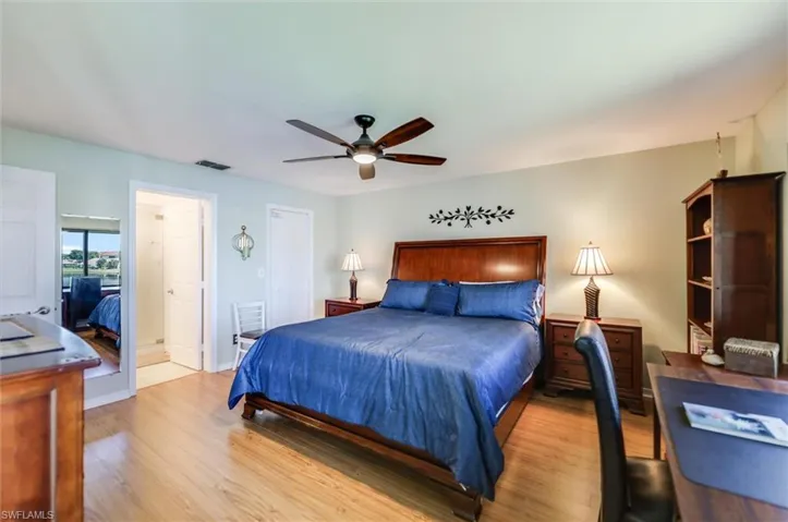 Bedroom featuring light wood finished floors and a ceiling fan