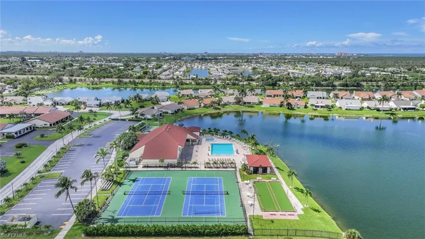 Aerial view of residential area with a large body of water